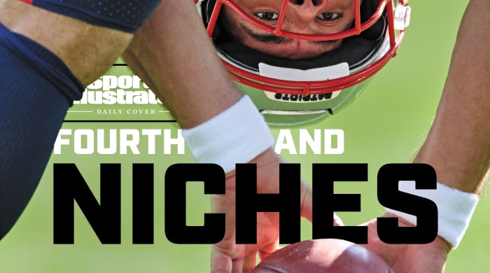 Patriots long snapper Joe Cardona looks back between his legs